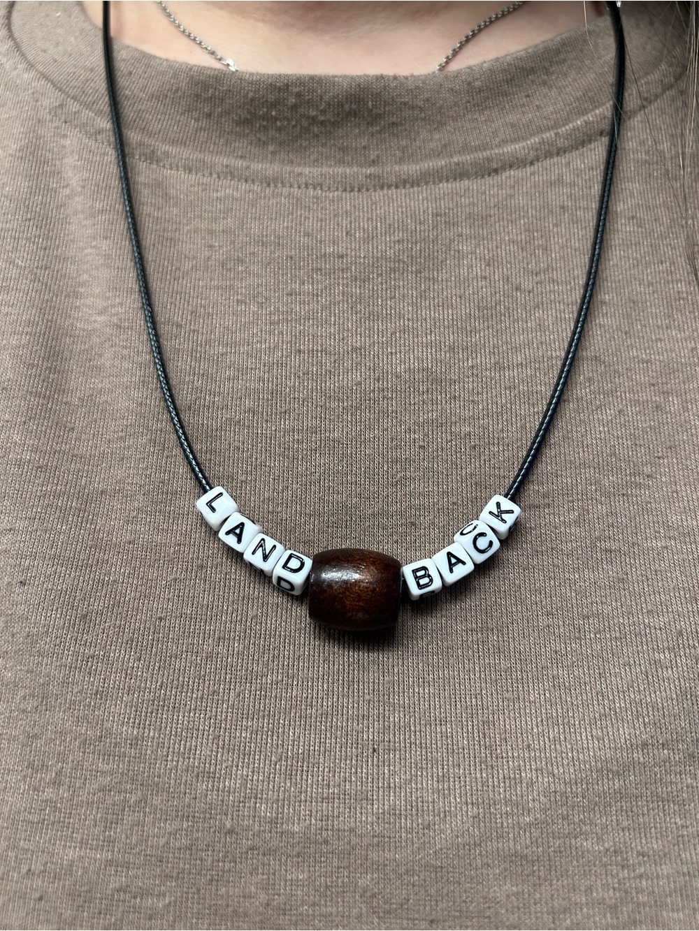 Beaded 'Land Back' Cord Necklace with Wooden Accent